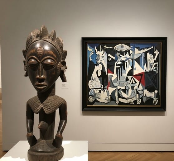 Spotlight on African Artists: Their Impact on World Art 1 an image of a traditional African sculpture next to a Picasso work