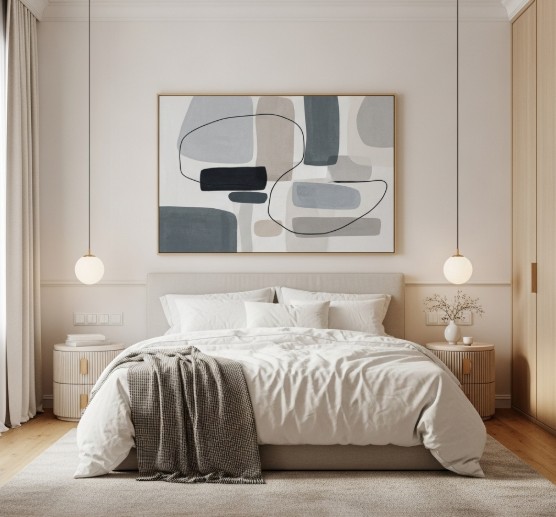 The Role of Art in Creating a Harmonious Home Environment 1 A peaceful bedroom featuring muted-tone abstract art above the bed.