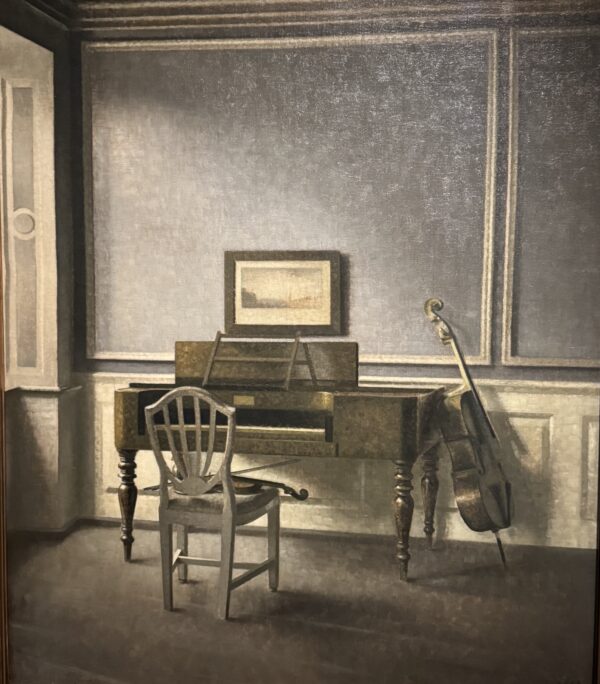 Interior with a Woman by Vilhelm Hammershoi